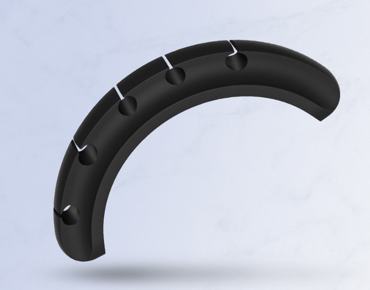 Flexible cable organiser close-up showing cable slots