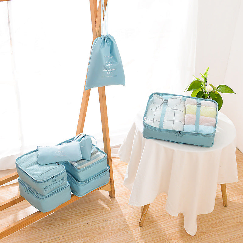 Blue eight-piece travel packing organiser set