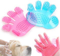 Pink and blue palm-fit pet bath grooming brushes with a dog