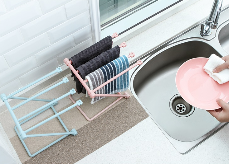 Foldable dishcloth rack shown open and folded