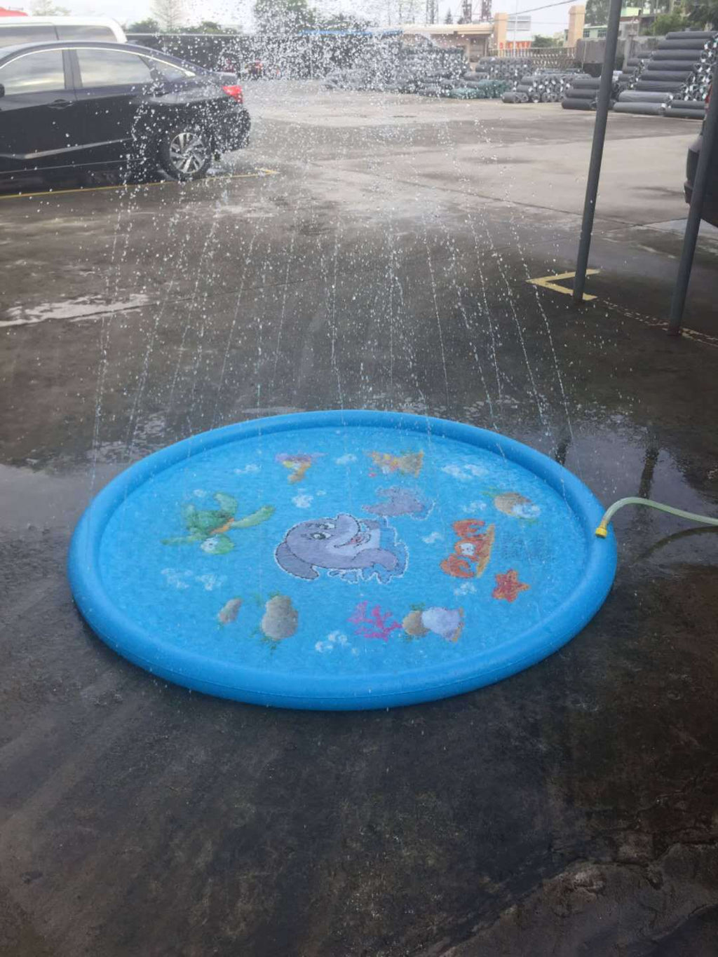 Blue sprinkler splash mat features