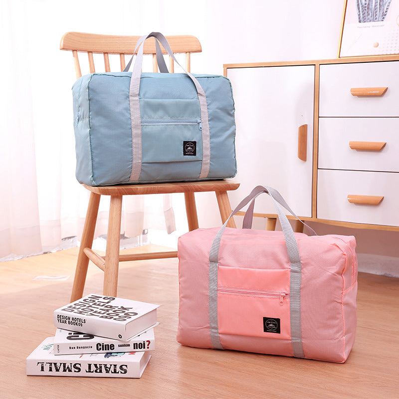 Fold-flat travel overflow bag in multiple colours