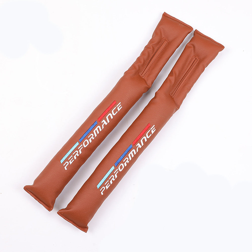 Brown car seat gap filler pair