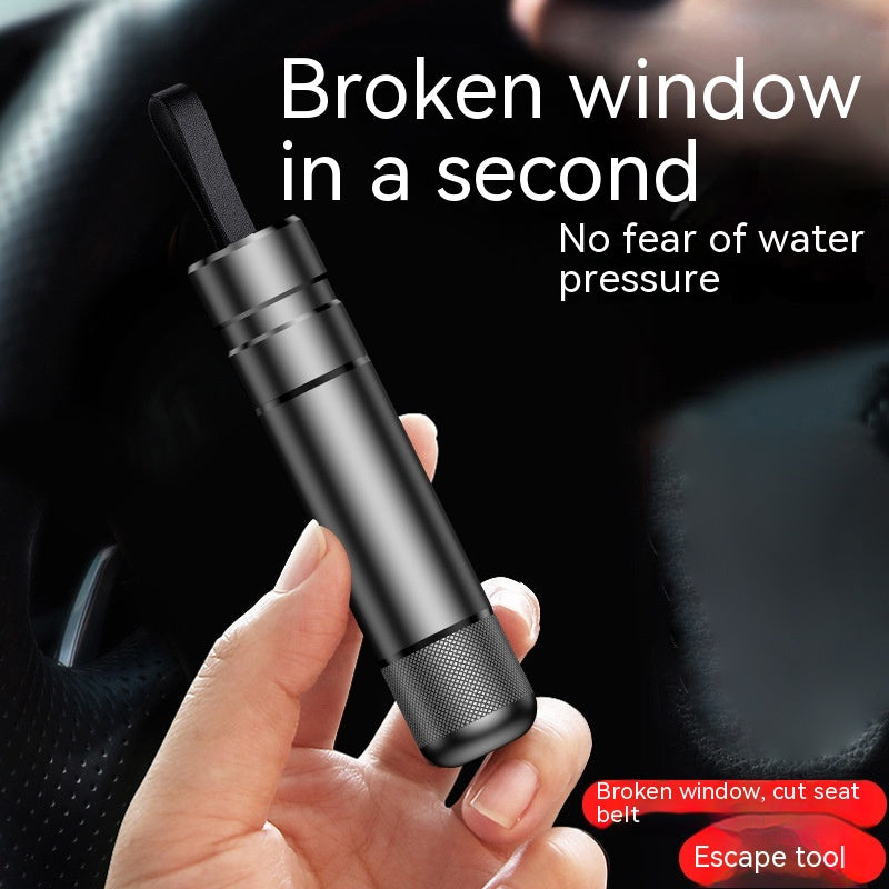 Compact car escape tool with glass-breaker point and belt cutter