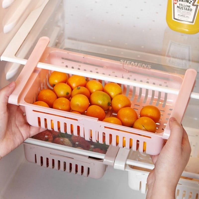 Under-shelf fridge organiser holding food items