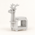 White reindeer-shaped bookshelf with open storage cubby and small display shelves