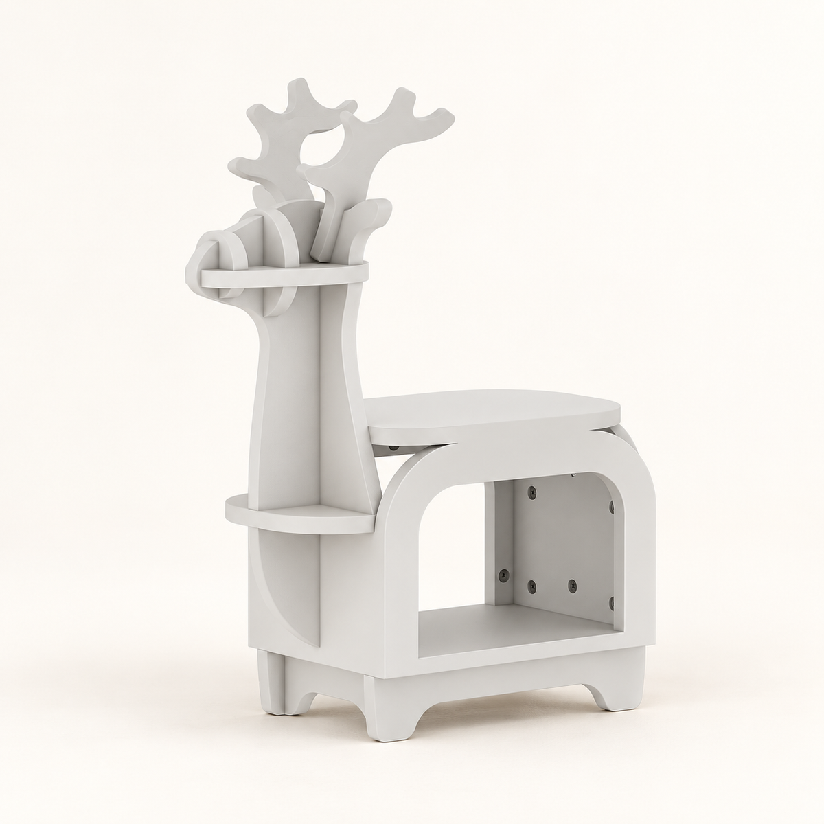 White reindeer-shaped bookshelf with open storage cubby and small display shelves