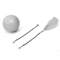 Grey rechargeable LED rolling cat toy with coloured attachments