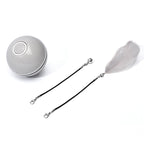 Grey rechargeable LED rolling cat toy with coloured attachments