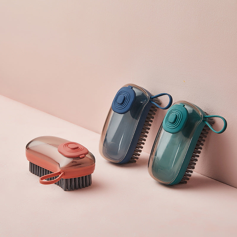 Cleaning brush in use on a shoe