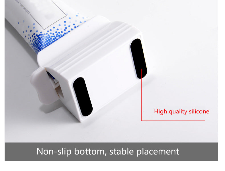 Red and white toothpaste tube squeezer pair